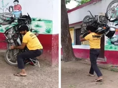 Amazing Strength: Watch This Young Man Carry a Bike on His Shoulder and Go Viral!